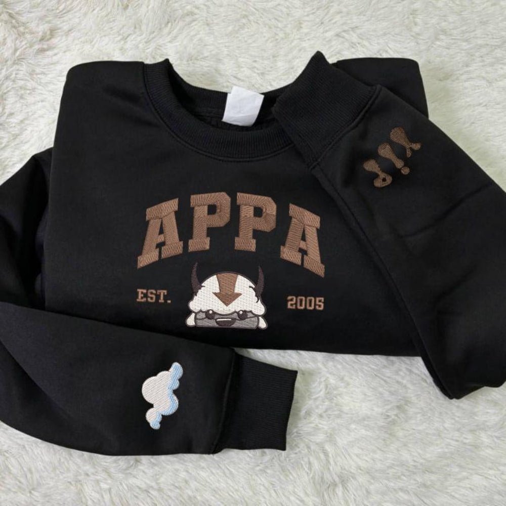 Black embroidered Appa sweatshirt with cloud and yip icons