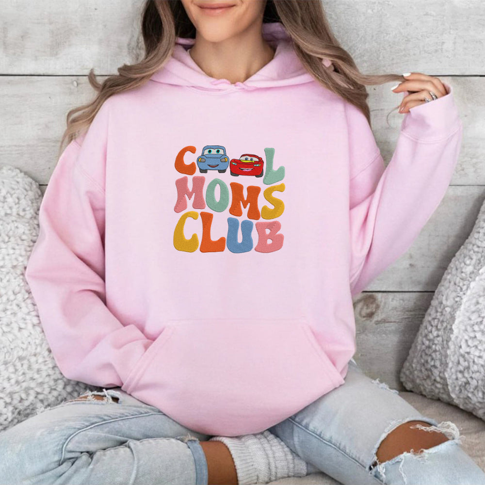 Pink Cool Moms Club hoodie with embroidered McQueen Sally