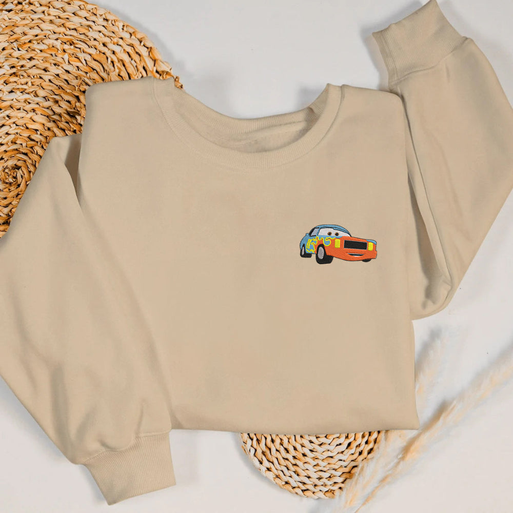 Beige Darrell Cartrip tiny embroidered sweatshirt, woven mat background