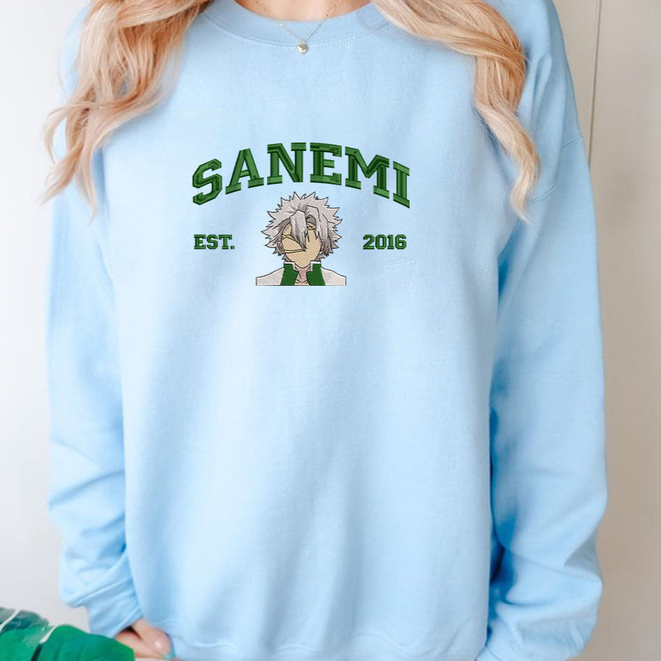 Light blue sweatshirt with Sanemi embroidery worn by a model.