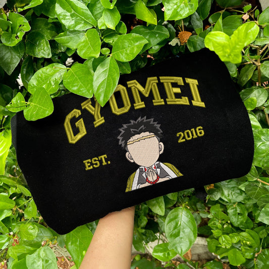 Black Gyomei Himejima Est.2016 embroidered sweatshirt on green leaves