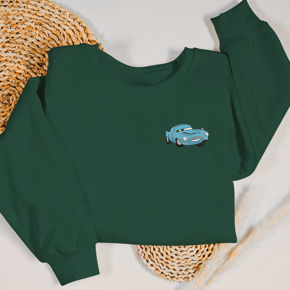 Forest green crewneck featuring Finn McMissile spy car embroidery