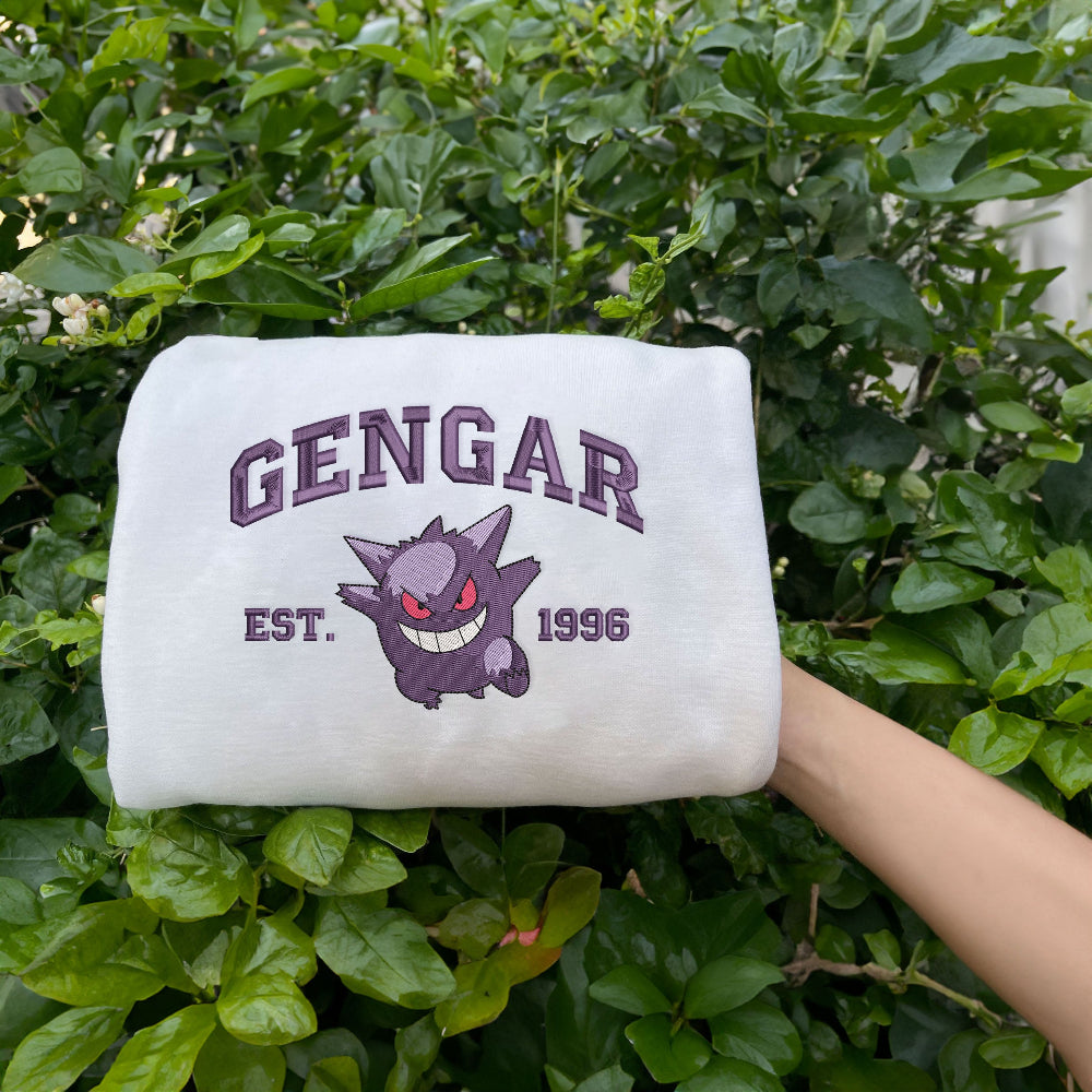 White Gengar Est.1996 Crewneck Held In Lush Garden