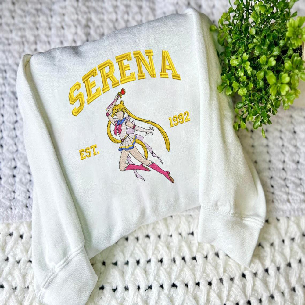 White Serena Moon Est.1992 crewneck with green plant decor