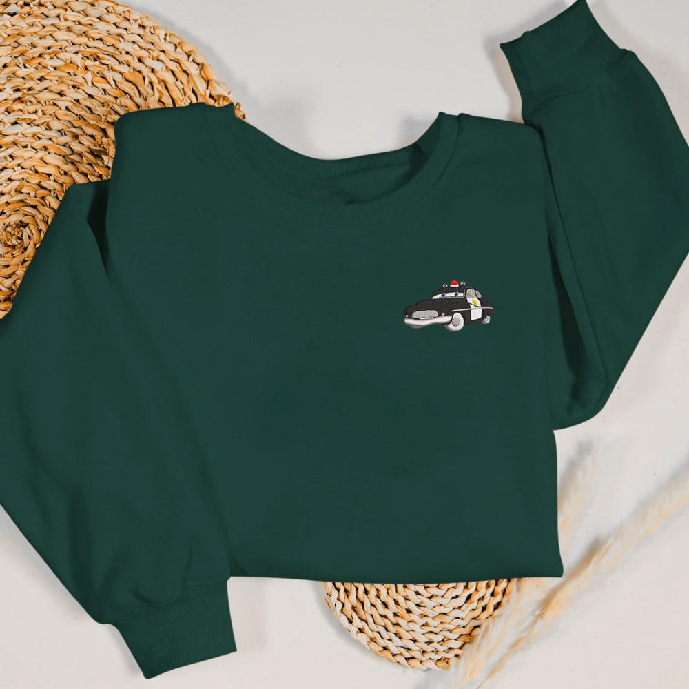 Forest green Sheriff embroidered sweatshirt styled with woven mats