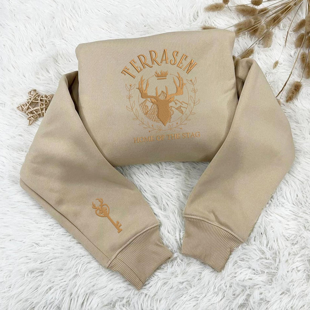 Sand beige Terrasen gold stag embroidery sweatshirt, cozy flat lay