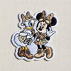 Safari Minnie And Daisy Character Patch On Neutral Background
