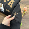 Appa Embroidered Sweatshirt black sleeve yip embroidery detail