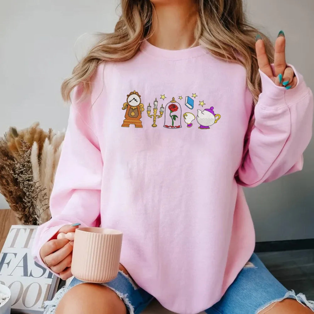 Pink Sweatshirt Beauty And The Beast Objects Embroidered On Model.