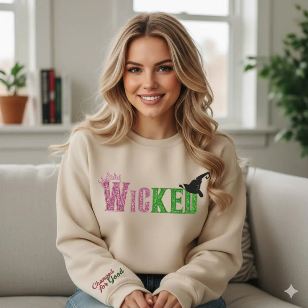 "Wicked" Embroidered Sweatshirt Modeled By Smiling Woman Indoors