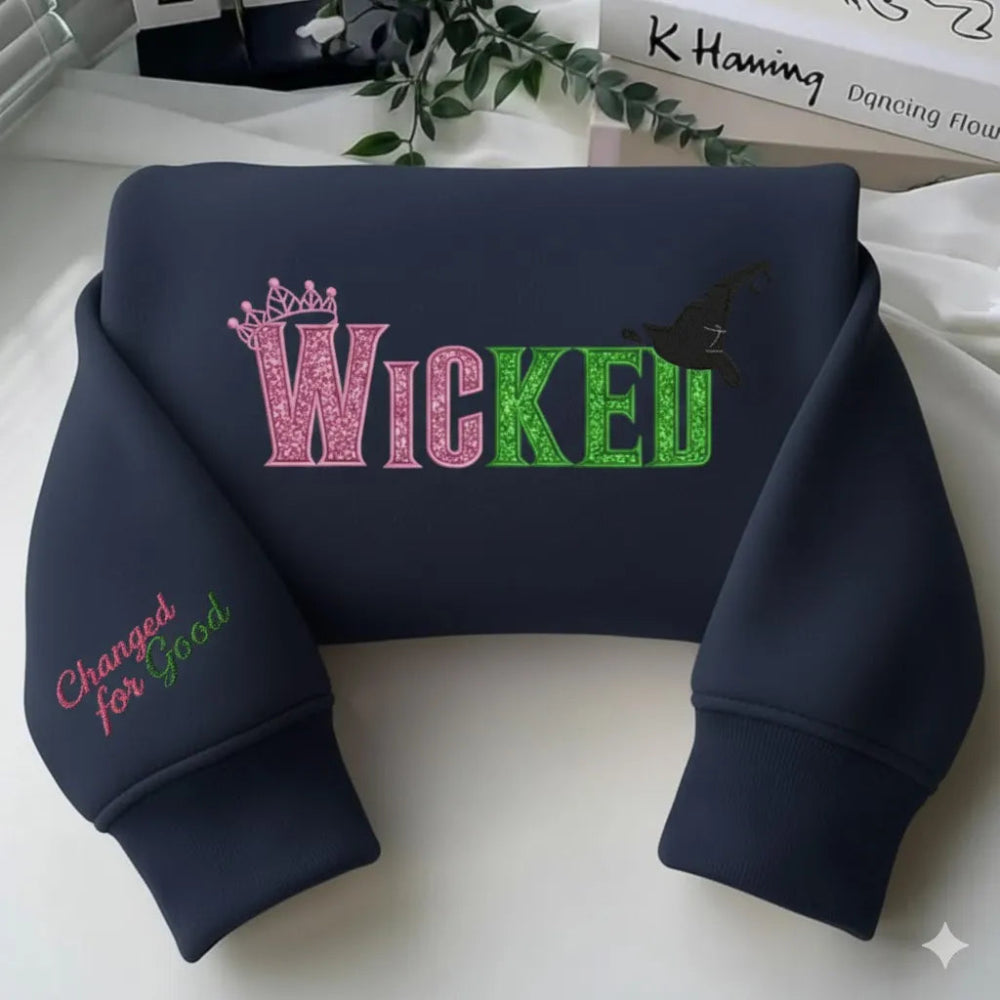 Navy "Wicked" Embroidered Sweatshirt With Crown And Witch Hat Details.