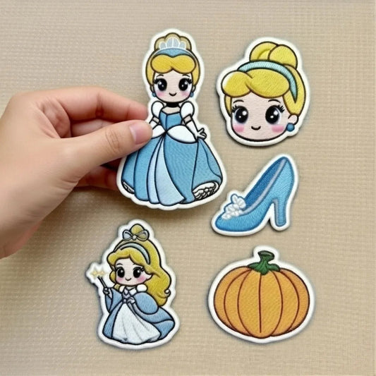 Hands Holding Collection Of Cute Cinderella Patches