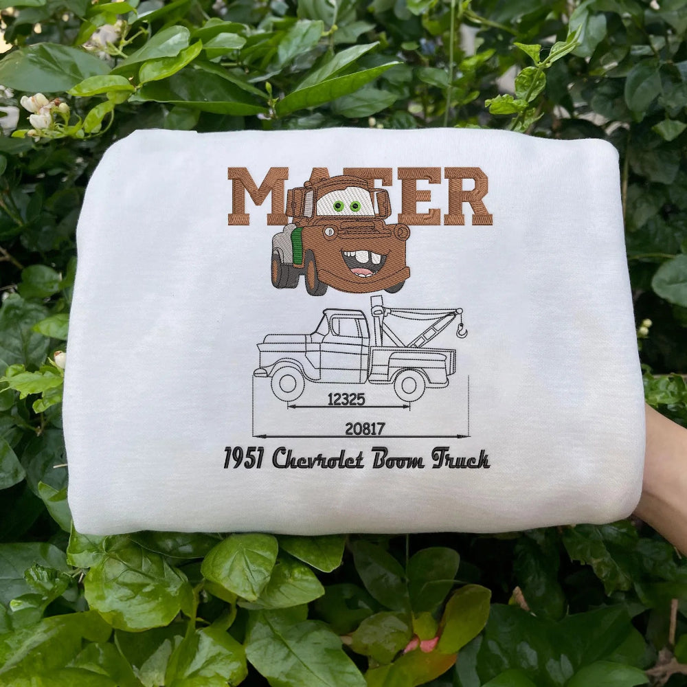 Folded White Sweatshirt With Embroidered Mater Tow Truck Blueprint Design
