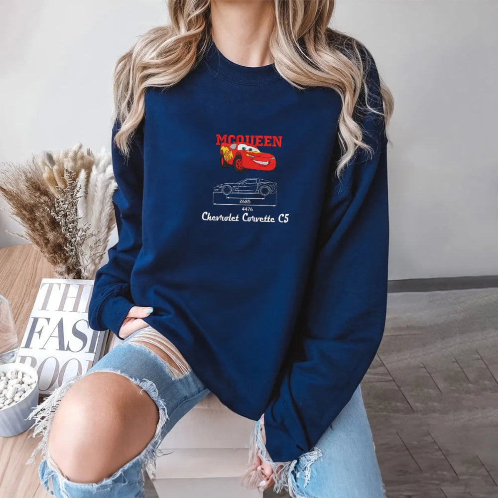 Folded Navy Sweatshirt With Embroidered Mater Tow Truck Blueprint Design