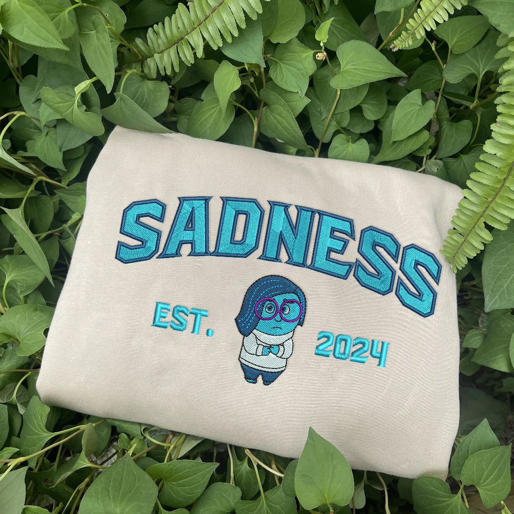Sadness Embroidered Crewneck Folded, Teal Sad Chibi Embroidery