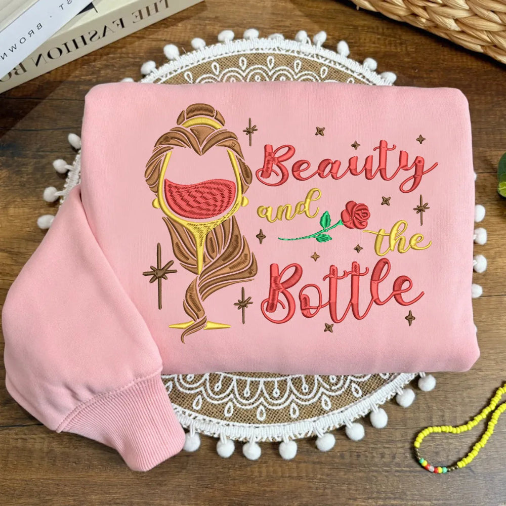 Pink Sweatshirt With Beauty And The Bottle Embroidered Belle Design.