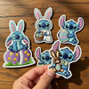 Hand Holding Adorable Stitch Hugging Bunny With Easter Egg Patch
