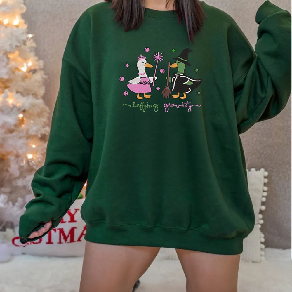 Defying Gravity Goose Embroidered Sweatshirt in Forest Green
