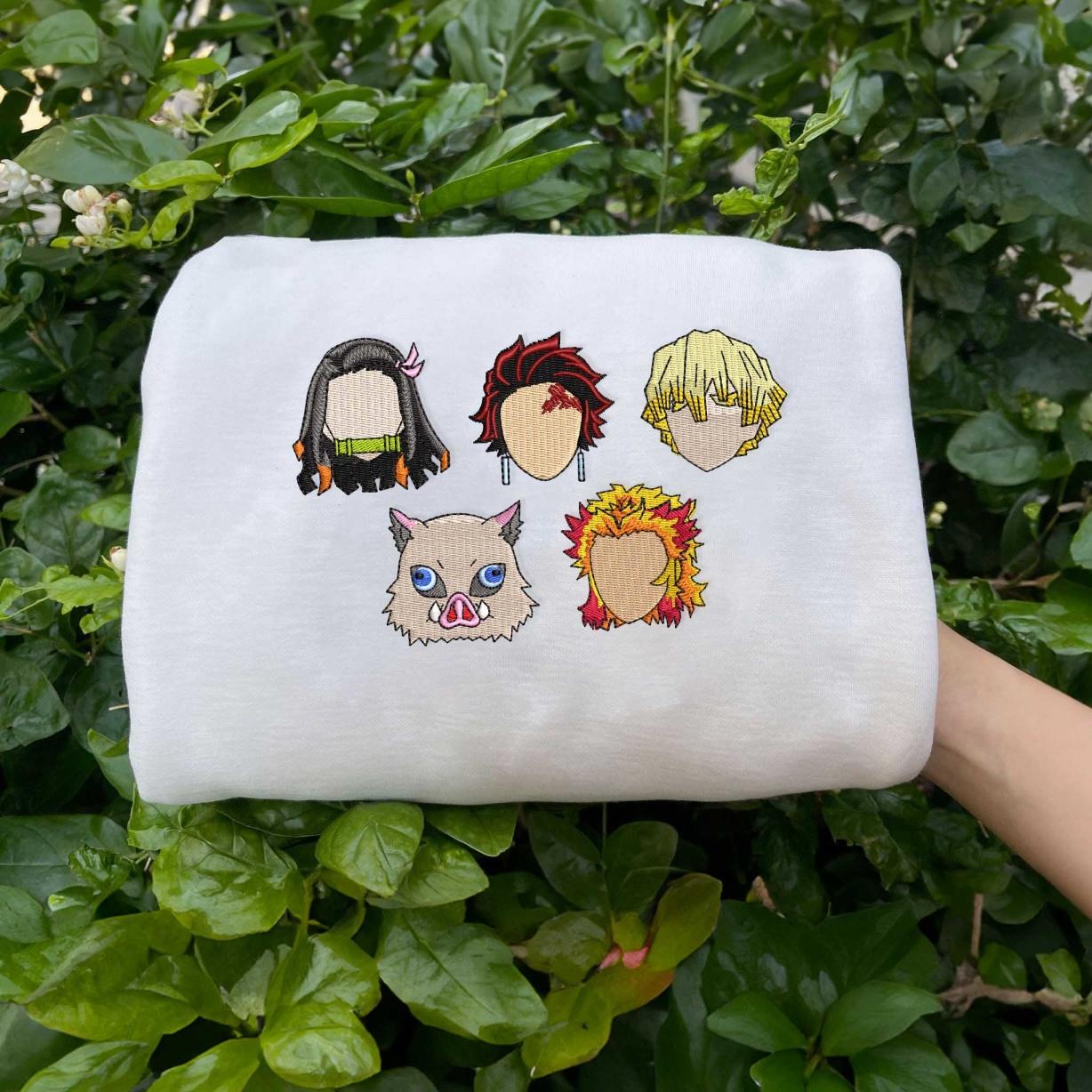 White sweatshirt with Demon Slayer character embroidery