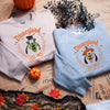  Goofy Halloween Sweatshirts On Newspaper Background