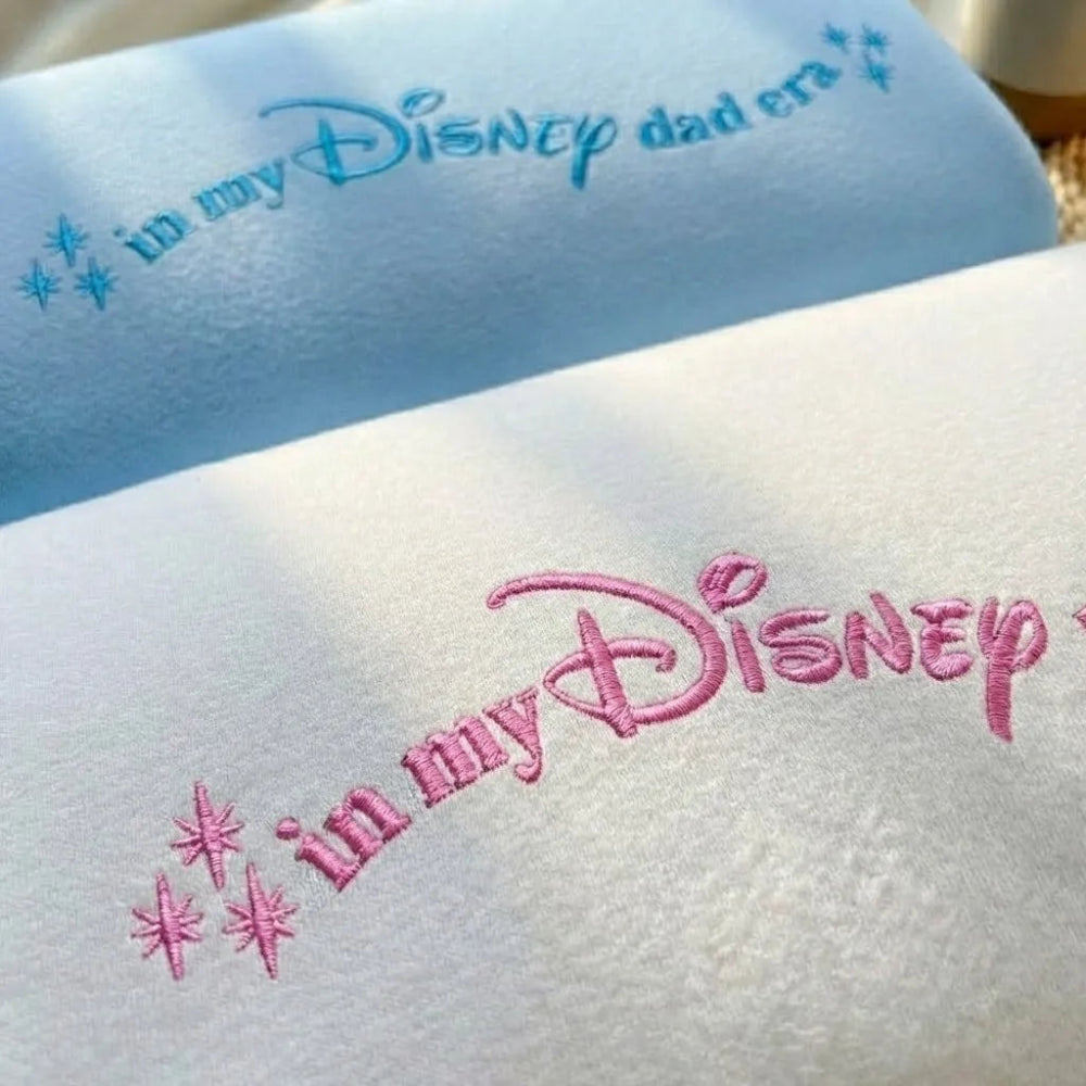 White Sweatshirt In My Disney Dad Era Blue Embroidery Folded.