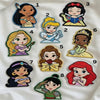 Numbered Disney Princess Patches One To Nine On Fabric Background

