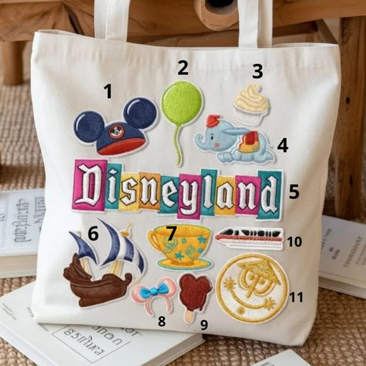 Numbered Displayed On Table With Full Set Of Disneyland Patches