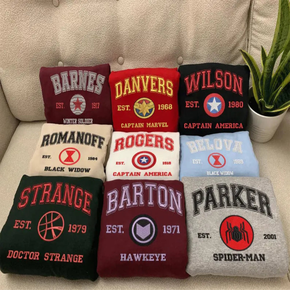 Assorted Marvel Hero Varsity Sweatshirts On Couch, Barnes To Parker
