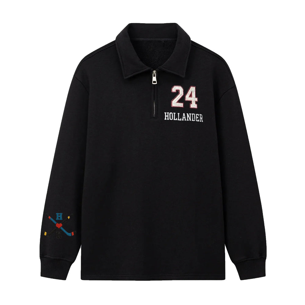 Black "24 Hollander" Hockey Embroidered Quarter-Zip Sweatshirt Flat Lay.