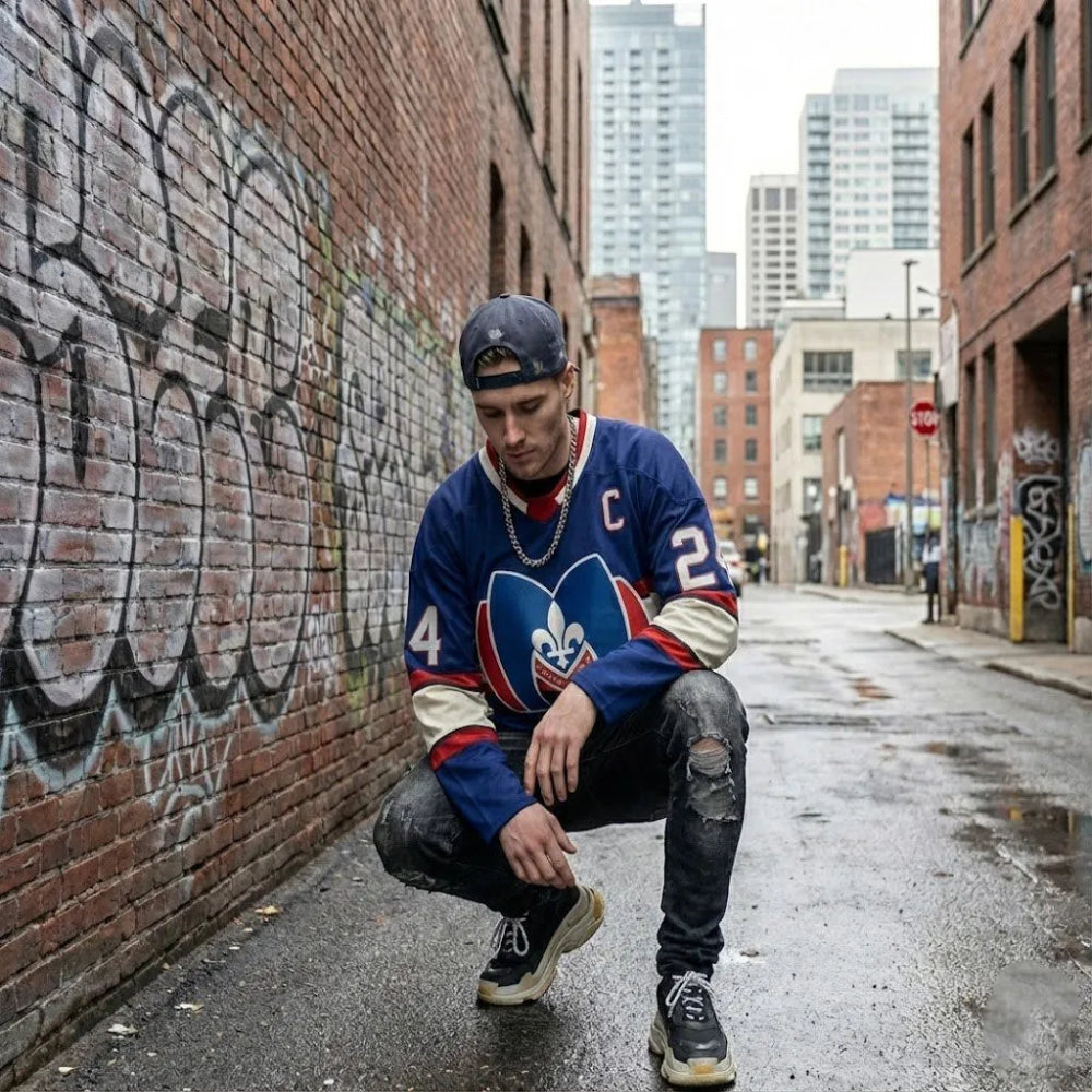 Man Crouching In Navy Hollander 24 Hockey Jersey Alley