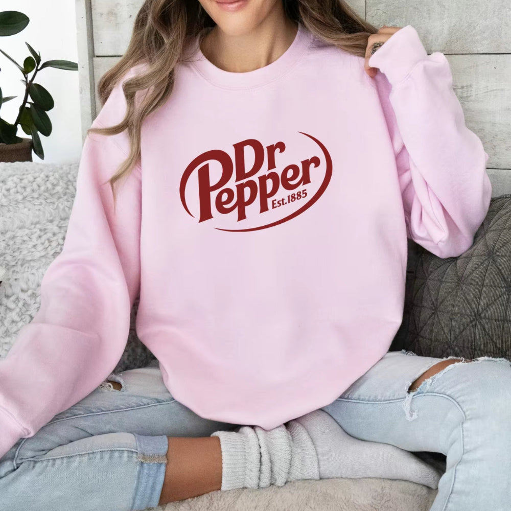 Baby pink Dr Pepper Est.1885 sweatshirt, cozy model styling