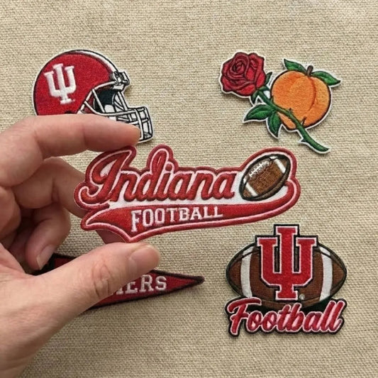 Close-Up Display Of Indiana Football Patch With Script Text