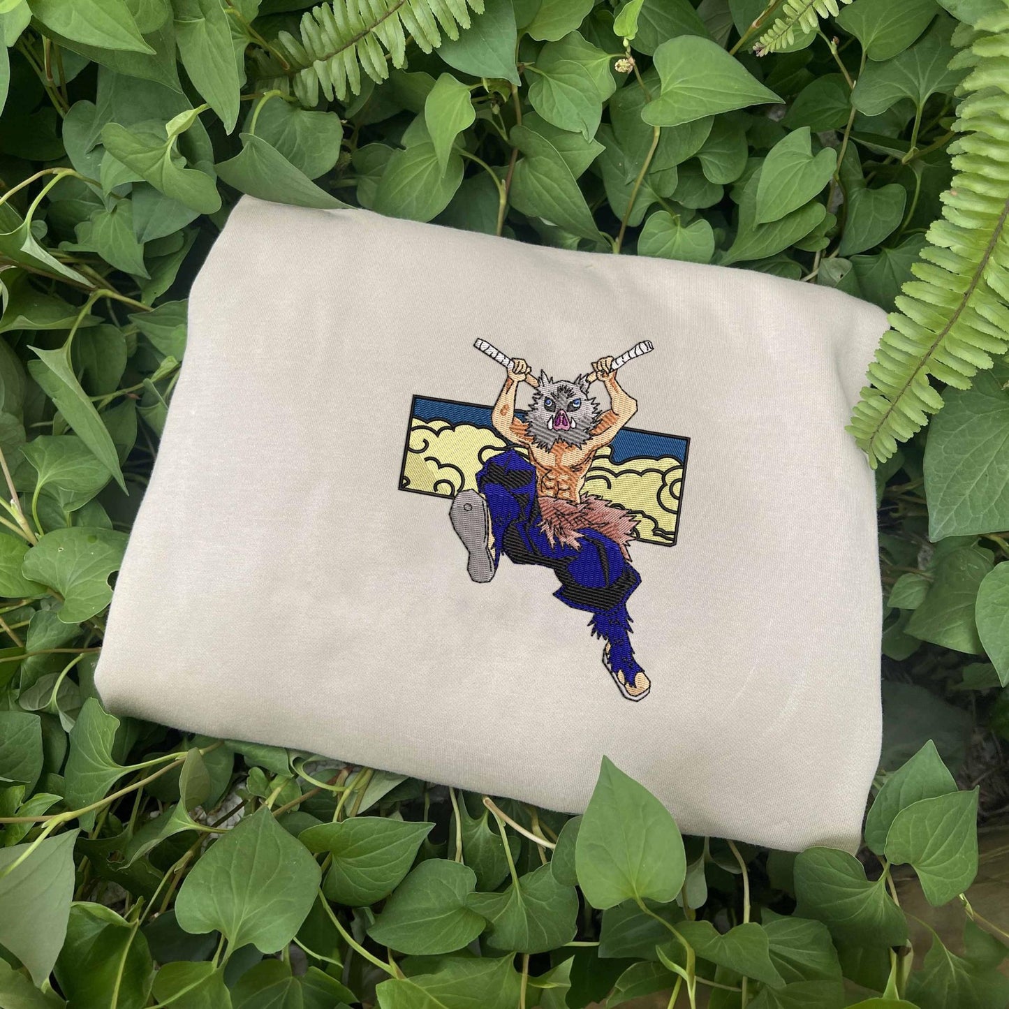 Embroidered sweatshirt featuring Inosuke from Demon Slayer