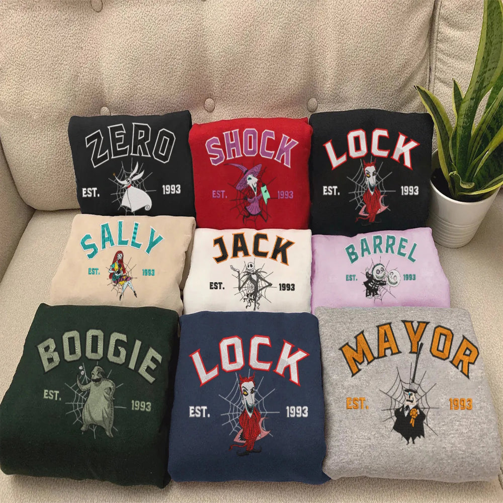 Folded Sweatshirts Displayed On Couch Featuring Jack Skellington Friends Characters