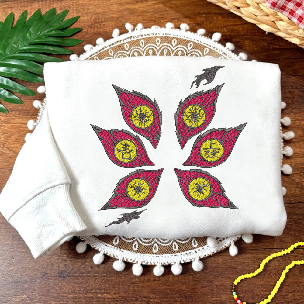 White Sweatshirt On Mat Showing Red And Yellow Six Eyes 