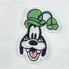 Lucky Goofy Shamrock Character Patch Closeup On Fabric Background