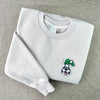 Lucky Goofy Shamrock Embroidered Patch On Beige Sweatshirt