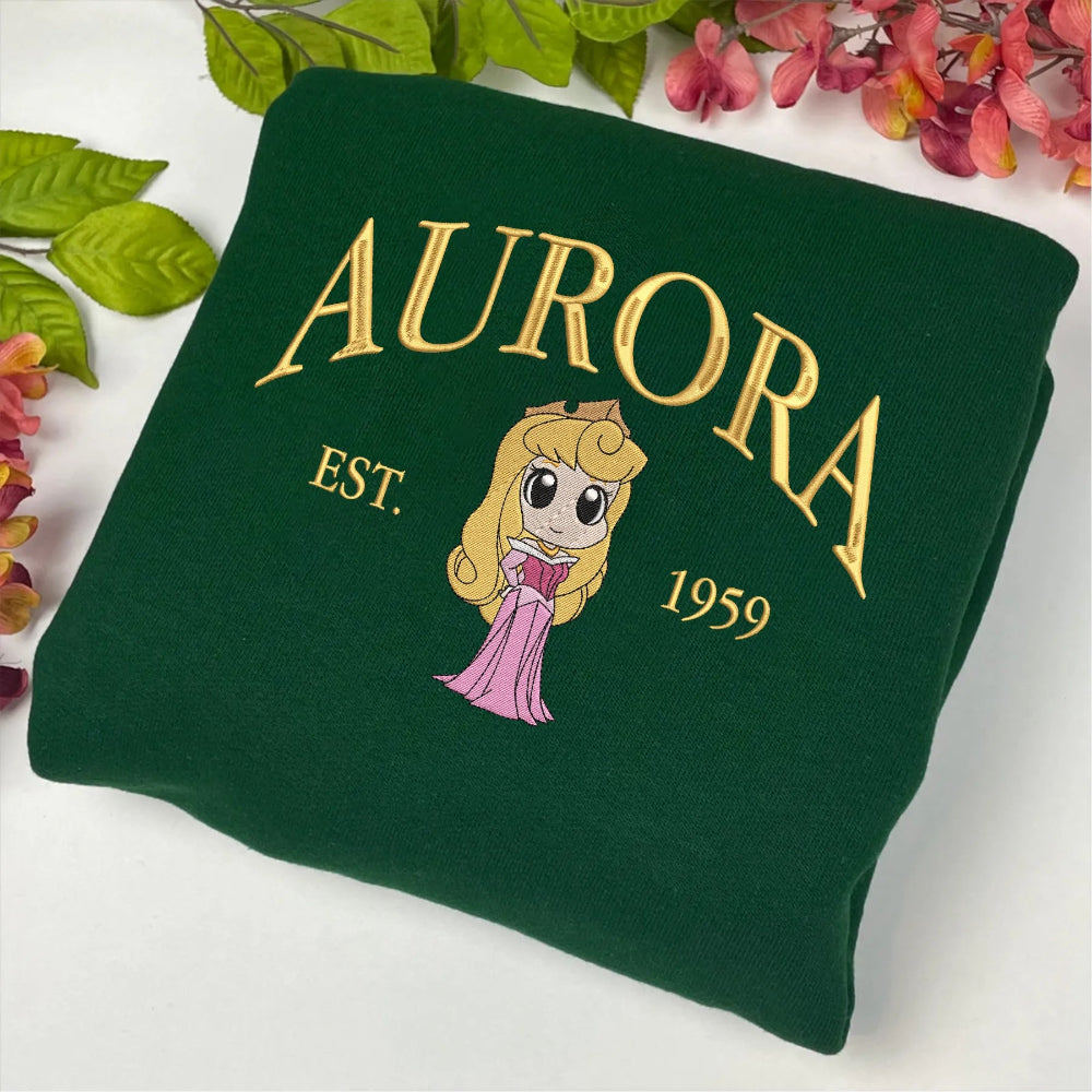 Folded Aurora Embroidered Sweatshirt With Gold Text And Chibi Princess
