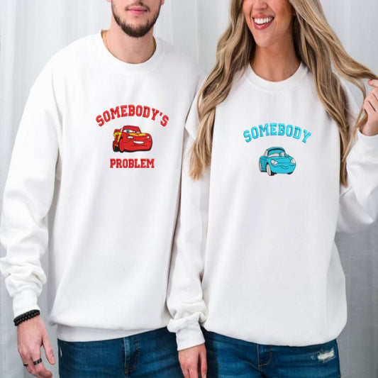 Couple Wearing White Mcqueen Sally Sweatshirts.