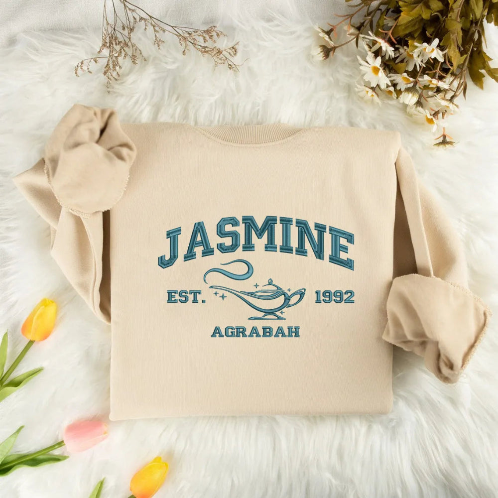 Sand Jasmine Embroidered Sweatshirt With Teal Text And Chibi Character