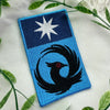 Minnesota State Flag Patch With Loon Bird On Fabric Background