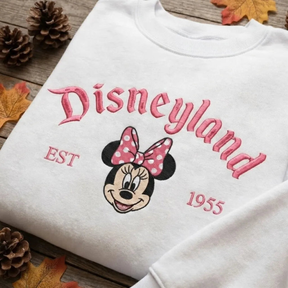 White Sweatshirt Minnie Mouse Disneyland Est 1955 Pink Embroidery Folded.