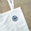 Mockingjay Embroidered Patch On White Tote Bag Display
