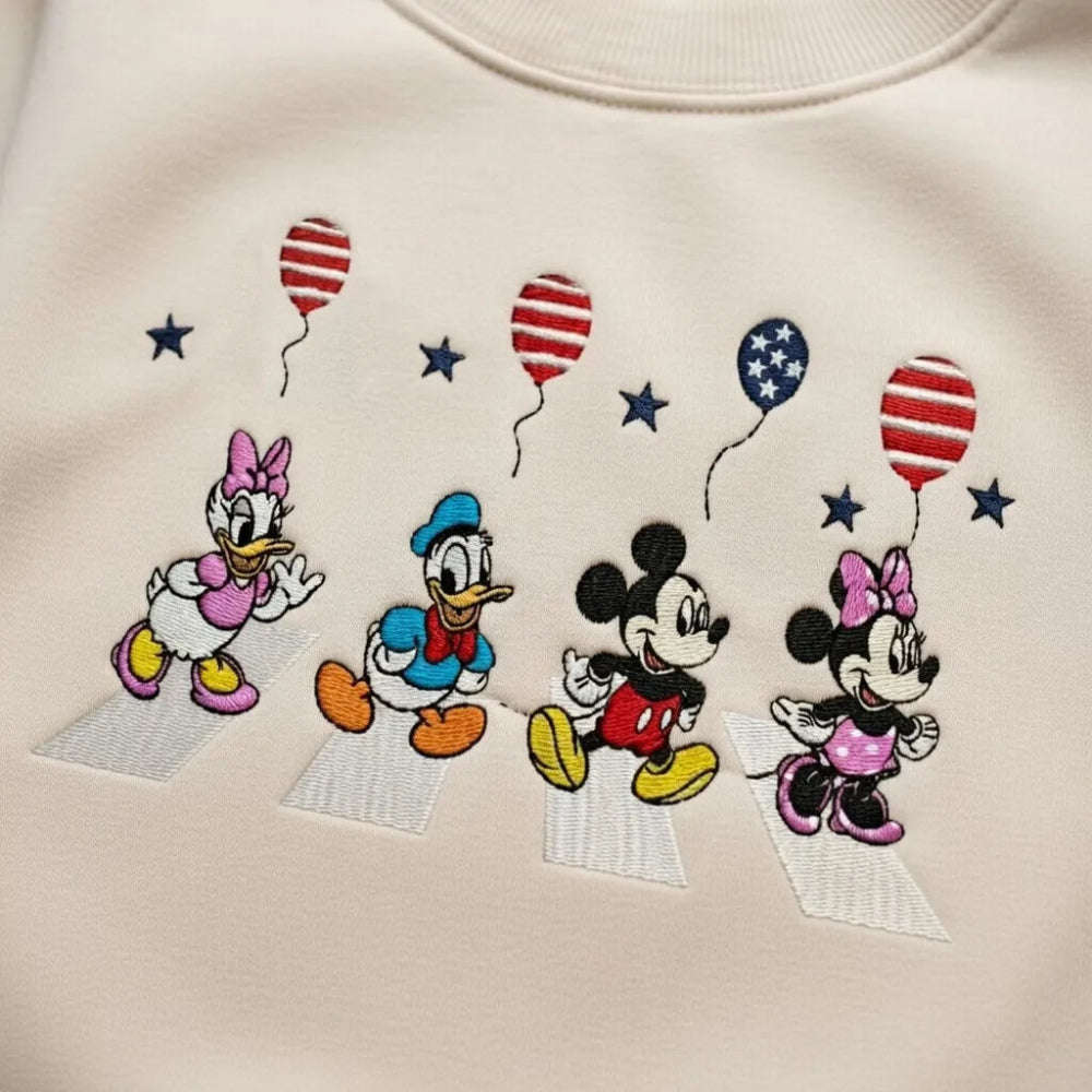 Sand Sweatshirt Close-Up Patriotic Disney Characters Embroidered On Abbey Road.