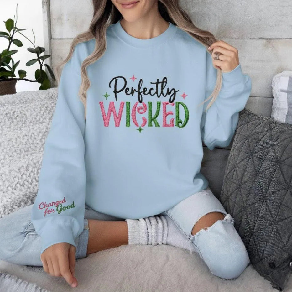 Light Blue "Perfectly Wicked" Embroidered Sweatshirt Worn Relaxed.