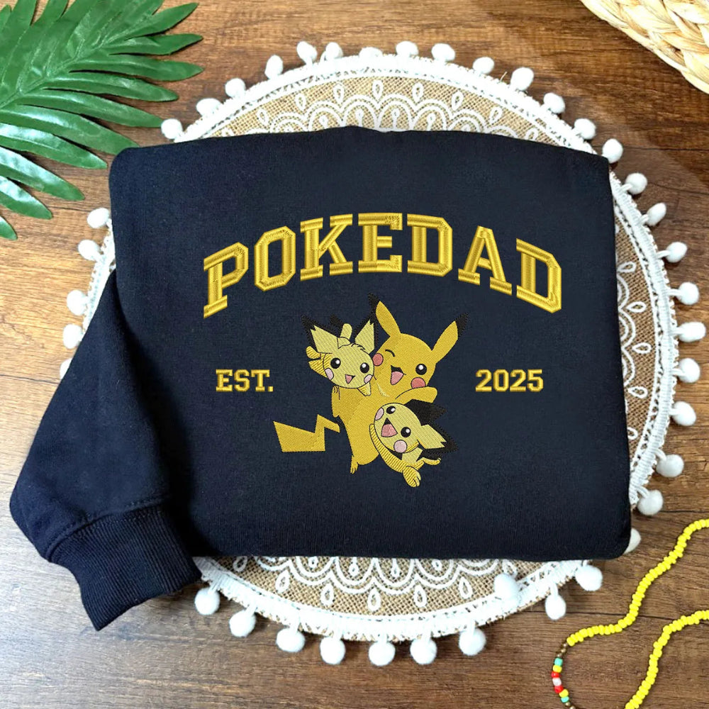 Navy Sweatshirt With Gold Embroidered Pokedad And Playful Pikachu Trio