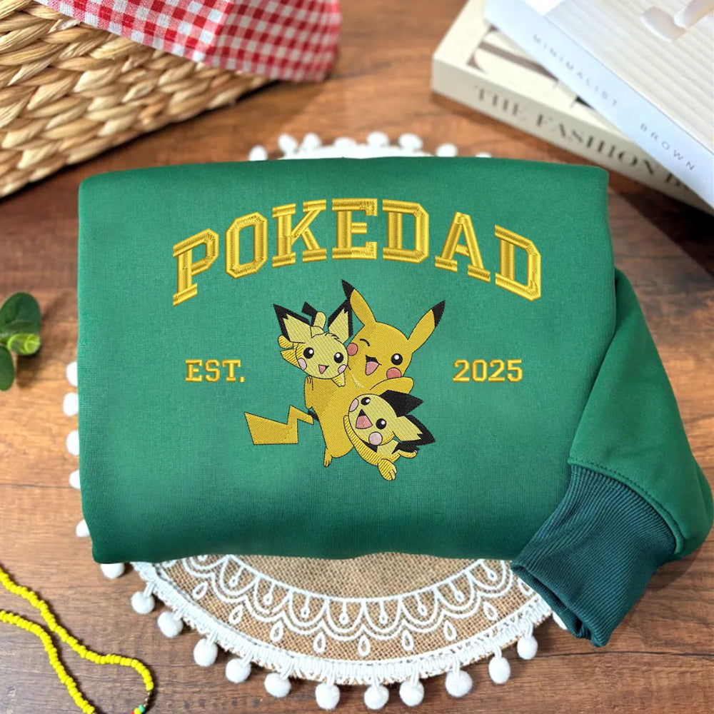 Cozy Sweatshirt Displaying Golden Pokedad Design With Pikachu Est 2025