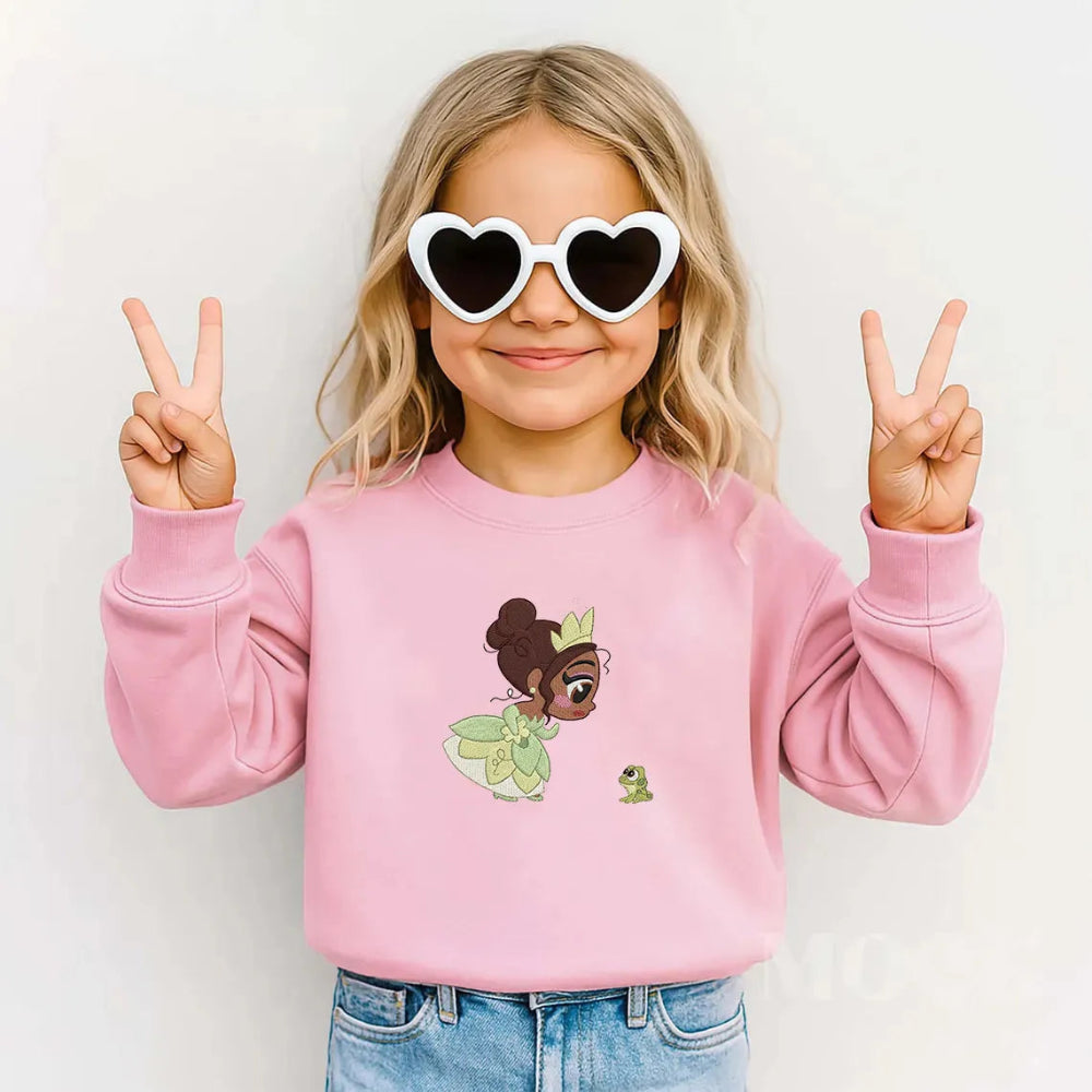 Pink Kids Sweatshirt Modeled With Adorable Tiana And Frog Embroidery
