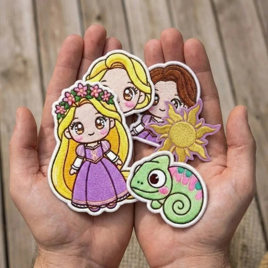 Hands Holding Collection Of Kawaii Rapunzel Chibi Embroidered Patches