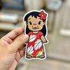 Close-Up Of Adorable Lilo Patch In Red Leaf Dress With Flower